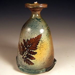 clay oil lamp with leaf impressions image 3