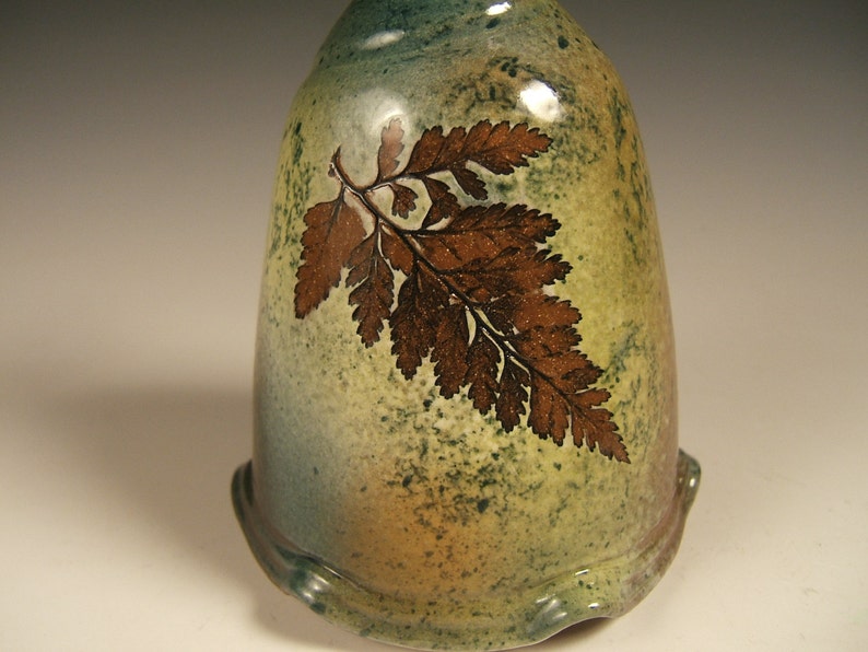 clay oil lamp with leaf impressions image 5