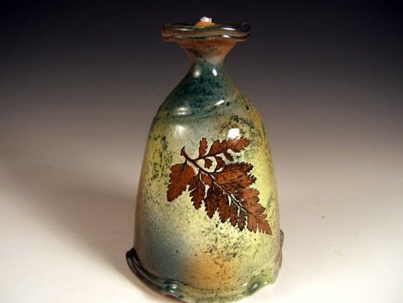 Clay oil lamp with leaf impressions Etsy