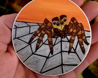 Leuke ronde kunststicker spin