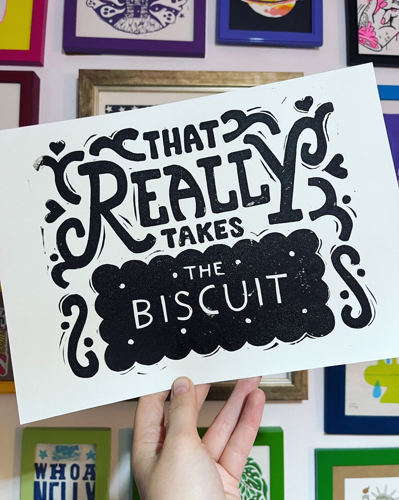 That takes the biscuit linocut print Black on White