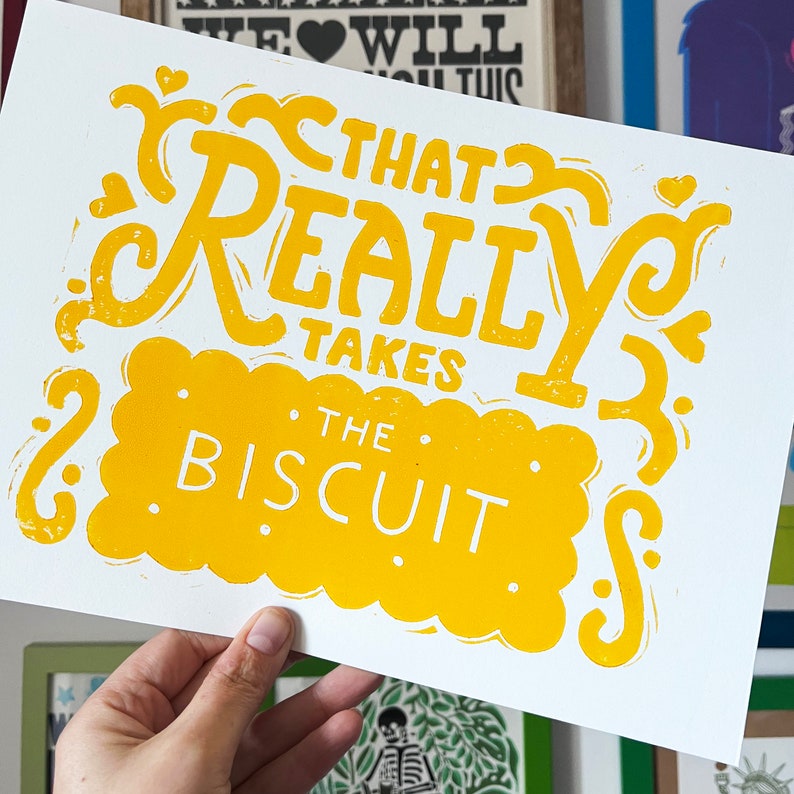 That takes the biscuit linocut print Custard cream Yellow