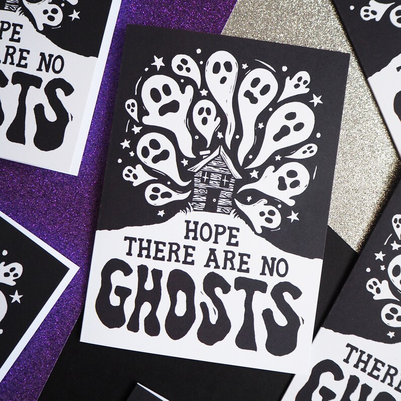 May include: Black and white greeting card with a house surrounded by ghosts. The text reads "Hope there are no ghosts".