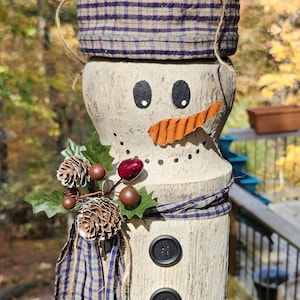 one-of-a-kind rustic wooden snowman - just waiting to sit on your mantle!!