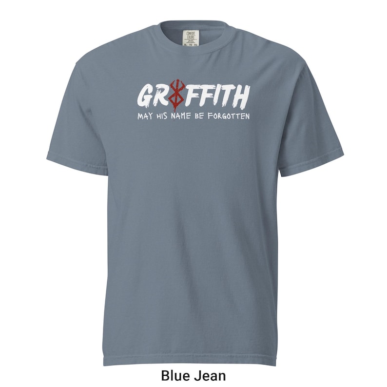 May include: A blue jean t-shirt with white text that reads "Griffith May His Name Be Forgotten" and a red and white symbol.