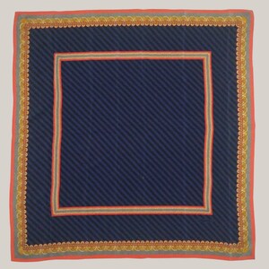 May include: Square navy blue scarf with diagonal stripes. The scarf has a red border with a gold scalloped design. A smaller red and gold square border frames the navy blue center.
