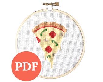 May include: A cross-stitch pattern of a pizza slice featuring a tan crust, yellow cheese, and red pepperoni toppings, centered within a round wooden embroidery hoop. A red circular icon with the white text PDF is overlaid on the lower left.
