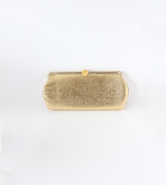 metallic gold clutch bag