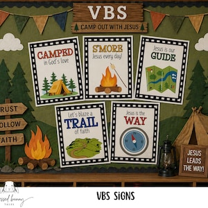 May include: A bulletin board with a camping theme, featuring signs with phrases like "Camped in God's love" and "Jesus is the way." The board includes a wooden sign that says "VBS Camp Out With Jesus" and a small framed sign that says "Jesus Leads the Way!"