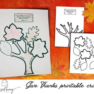 May include: A printable Thanksgiving craft for kids featuring a tree with leaves that can be colored in. The leaves are labeled with words like "Jesus", "Bible", and "Family". The craft includes a quote from Psalm 107:1, "Give thanks to the Lord for He is good: His love endures forever."