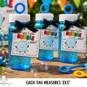 May include: Clear blue plastic bubble solution bottles with white caps and blue bubble wands. Each bottle features a black ribbon and a square white tag with the text Let your faith BUBBLE over! and a cartoon bubble. Each tag measures 3x3 inches.