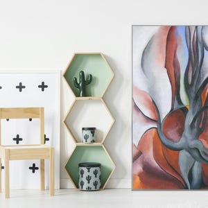 May include: Abstract painting of a tree with red, brown, gray, and green colors. The tree is in the center of the canvas and is surrounded by abstract shapes.