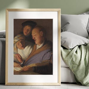 May include: A framed print of a painting depicting three figures singing. The central figure, a man with glasses, holds a book. The other two figures are positioned behind him, all in dark clothing.