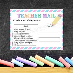 May include: A pastel-colored "Teacher Mail" card with a pencil illustration. The card includes fill-in-the-blank sections for recognizing positive student behaviors like being a good friend, helpful, and showing manners. Chalk sticks are in the foreground.