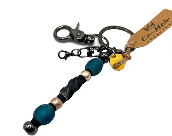 Llavero de herrero y cuentas de río