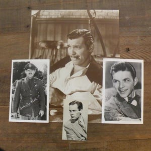 May include: A collection of four black and white vintage photographs featuring portraits of actors. One large central print shows a man with a mustache, flanked by a smaller portrait of a man in a military uniform, a man in a suit, and a small headshot.