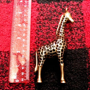 Vintage Giraffe Trinket Box Black and Gold Enamel Cast Metal with Jeweled Green Eyes, Hinged with Magnetic Closure Circa 1980