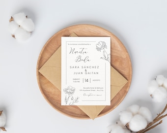 Puede incluir: Una invitación de boda blanca con texto negro e ilustraciones florales. El texto dice "Te invitamos cordialmente a Nuestra Boda Sara Sanchez & Juan Gaitan Sabado 7:00 PM | 14 | Agosto Borcelle Hotel & Ballroom 125 Anywhere Street, Any City Reception mas"