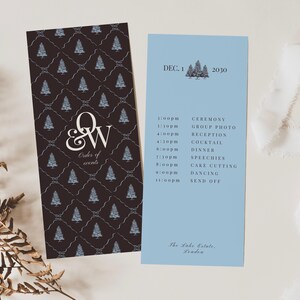 May include: Two wedding event cards. One is dark brown with a repeating pattern of blue trees and the initials "Q&W". The other is light blue with event details and the date "DEC. 1 2030".