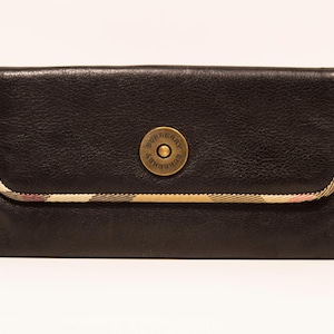 Portefeuille continental Burberry en cuir noir en très bon état