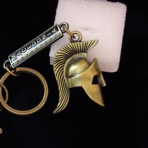 Ancient Greek Helmet of Macedonia Keyring, 7th Century BC Greek Helmet Keyring. Antique Brass coloured metal Greek Helmet Keyring.