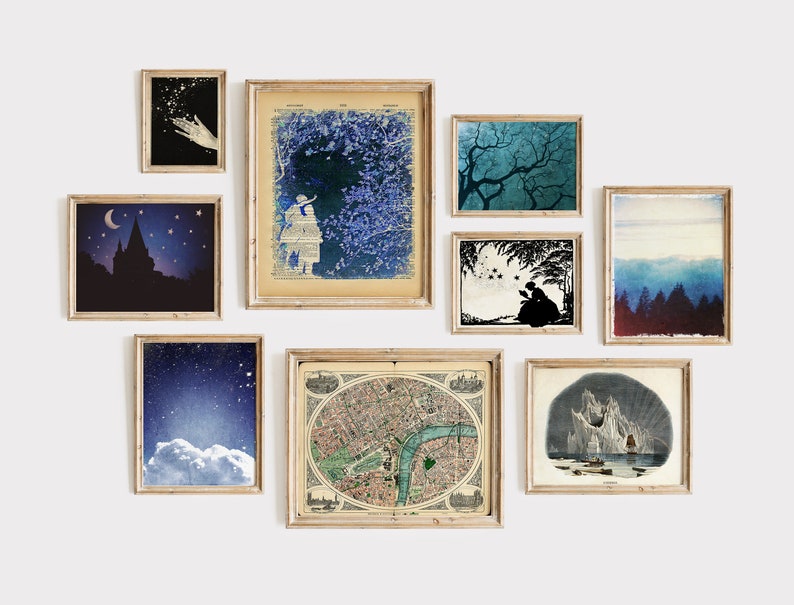 May include: A gallery wall with nine framed prints, including a map, a cityscape, a starry night sky, a silhouette of a castle, a girl looking at a tree, a silhouette of a couple, a forest, a mountain range, and a hand reaching for stars.