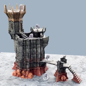 May include: A detailed model of a fantasy castle with a tall tower, bridge, and stairs. The castle is primarily grey with red and bronze accents. Small figurines are placed on the castle's platforms and walkways.