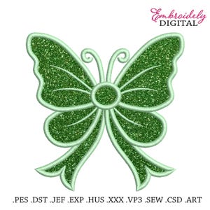May include: Green glitter butterfly embroidery design. This design is perfect for adding a touch of whimsy to your projects.