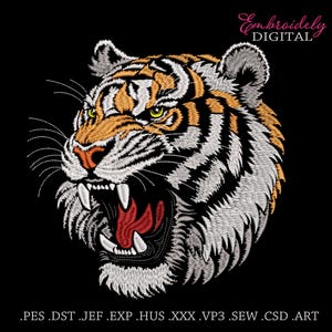 May include: Embroidered tiger head design with orange, white, and black stripes, open mouth, and sharp teeth. The tiger has yellow eyes and a pink nose. The text "Embroiderly DIGITAL" is in pink script. File formats are listed below the image.