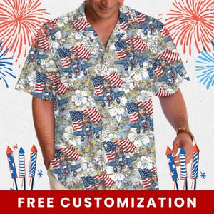 May include: Short-sleeved button-down shirt with a patriotic design. The shirt features a repeating pattern of an American flag, a vintage airplane, and a smiling face. The background has a floral pattern. The text "FREE CUSTOMIZATION" is at the bottom.