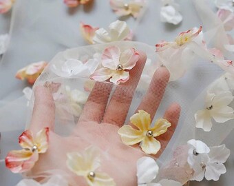 Tejido de malla con cuentas florales para vestidos y prendas de vestir.