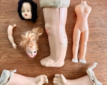 Doll Parts Assortment Including Pair of Heads with Sleepy Eyes, Torsos, Arms and Legs Vintage 1950s