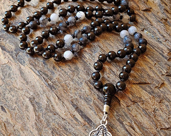 Silent Presence Black Spinel Mala: Hand-Painted Buddha Charm, Tourmaline Rutilated Quartz