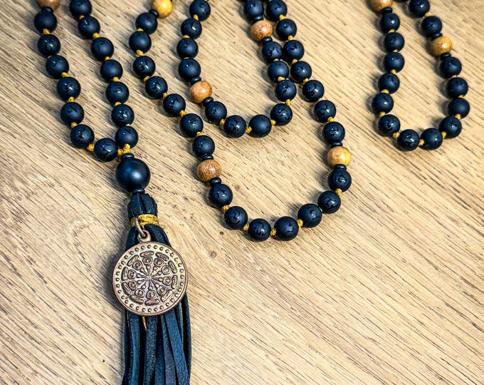 Dharma Within Mala: Om Mani Padme Hum Carved Obsidian, Nangka Wood & Black Agate, Leather Tassel with Copper Dharma Wheel