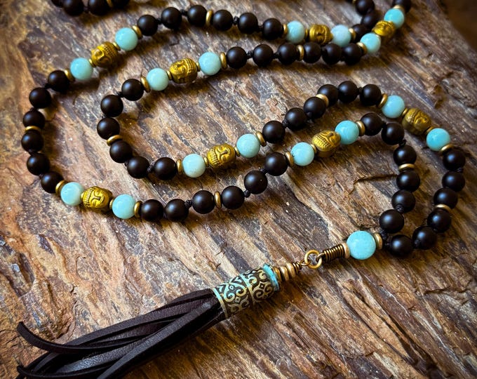 Inner Sanctuary Mala | Matte Black Onyx, Blue Amazonite & Gold Buddha Beads | Mosaic Shell and Deerskin Tassel