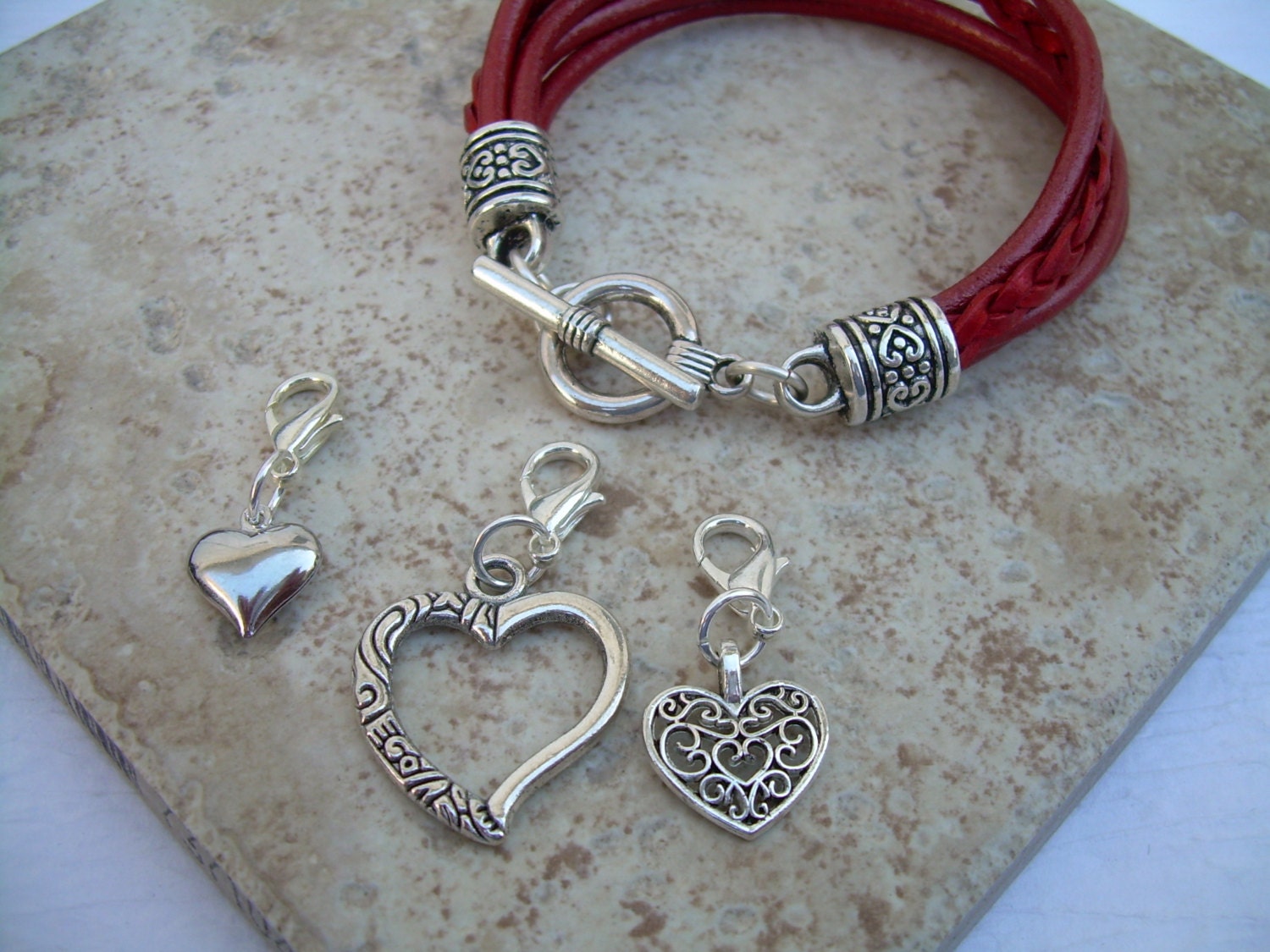 Beautiful women's handmade red leather bracelet with metal heart shaped  charm