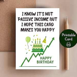May include: A white birthday card with the text "I KNOW IT'S NOT PASSIVE INCOME BUT I HOPE THIS CARD MAKES YOU HAPPY." The card features a green cake, balloon, and an upward trending arrow. The words "HAPPY BIRTHDAY" are also on the card.