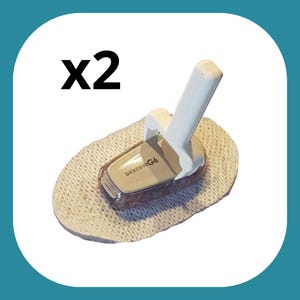 May include: Two white Dexcom G6 sensor applicators with beige adhesive pads.