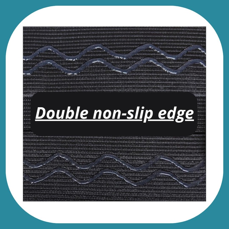 May include: Close-up of a black fabric with a double non-slip edge. The edge has a wavy pattern.