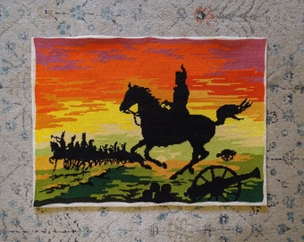 Vintage needlepoint canvas of Napoleon and his horse on the battlefield at Sunset - made in France, second hand, hand embroidered