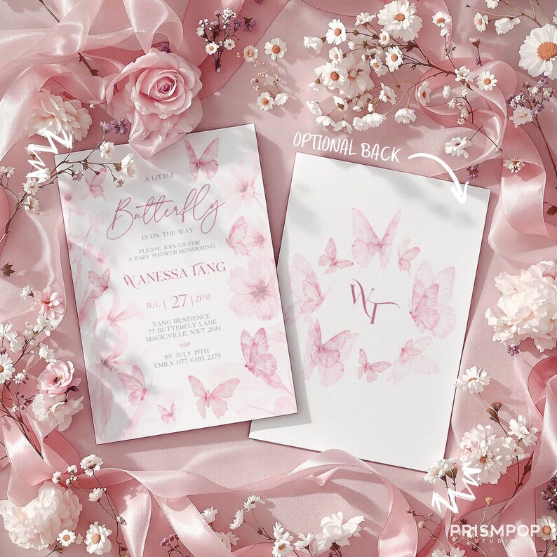 An elegant flat lay image of a soft and delicate pink-themed baby shower invitation. The invitation card features graceful watercolor pink butterflies, gentle florals, and refined script text that reads "A Little Butterfly Is On The Way," honoring Wanessa Tang. Surrounding the invitation are romantic details including blush pink silk ribbons arranged gracefully, fresh white and soft pink flowers, baby's breath, and delicate sprigs spread artistically across a pastel pink background.