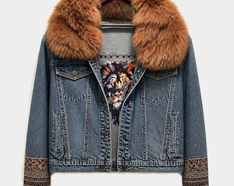 May include: A blue denim jacket featuring a large brown faux fur collar, a colorful lion graphic print on the inner lining, metal stud detailing along the front seams, and embroidered geometric patterns on the sleeve cuffs.