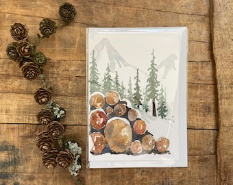 Hand-painted Watercolour Christmas Card, of snow covered log pile