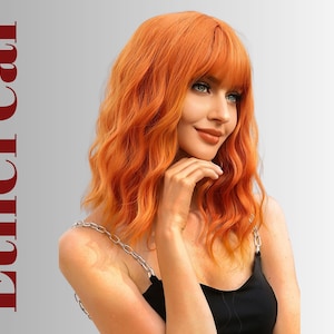 May include: A woman with wavy, orange hair and a fringe, wearing a black top with chain straps. The word "Ethereal" is printed vertically in red on the left side of the image. The woman is looking to the side with her hand on her chin.