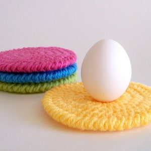Round crochet coasters on a white background. This listing is for an easy crochet pattern.