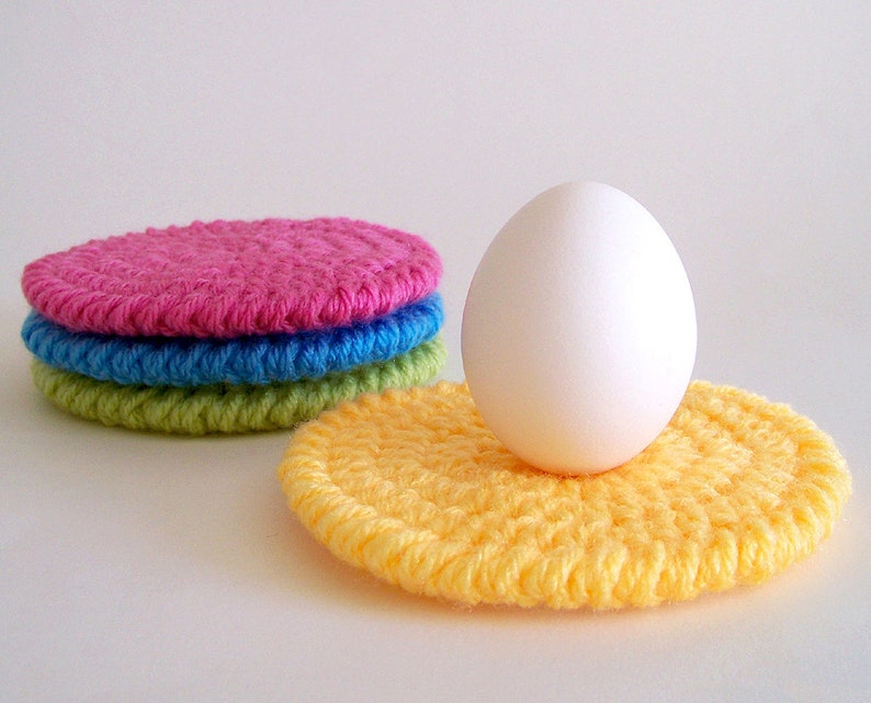 Round crochet coasters on a white background. This listing is for an easy crochet pattern.