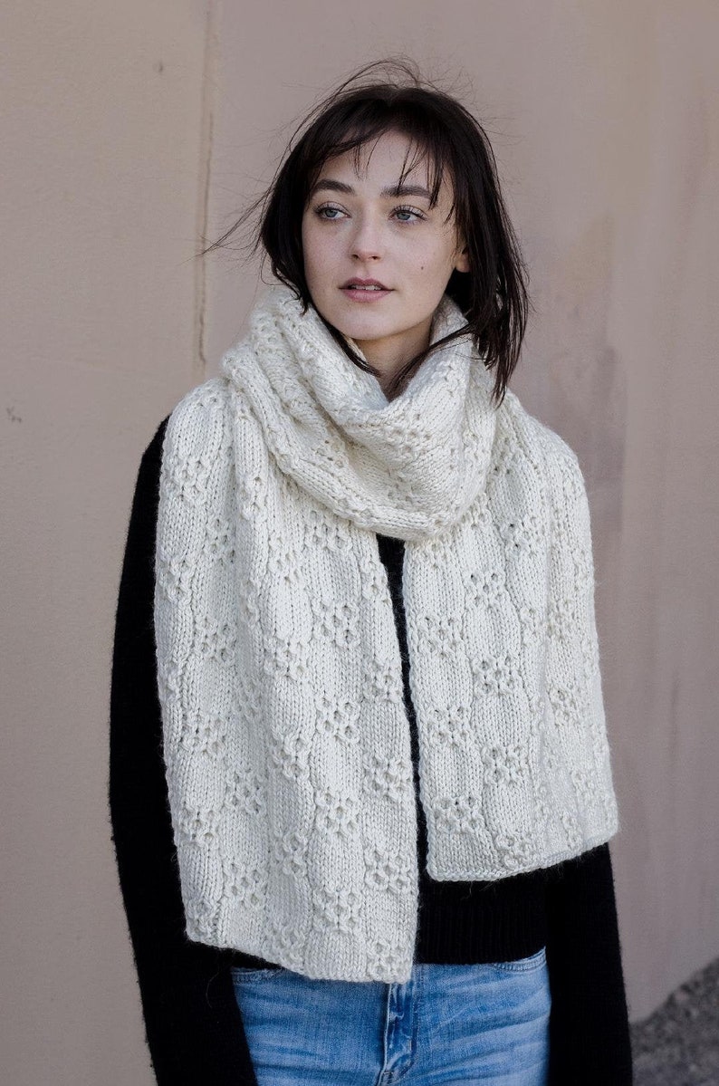 Model is wearing a chunky knit wrap scarf. This listing is for Back to Winter Scarf knitting pattern.