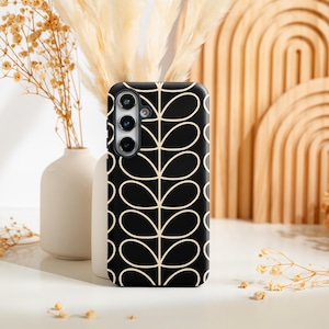 May include: Black smartphone case featuring a cream-coloured leaf pattern. The case has a camera module with three lenses and a flash. The design showcases a repeating pattern of stylized leaves, offering a modern aesthetic. The case is likely made of a durable material to protect the phone.