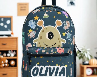 Mochila infantil con estampado alienígena: mochila escolar con temática de astronautas.