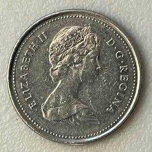 1953-2006 Canada 25 Cents Coin - *Year of your coin will vary between 1966-2006 unless otherwise specified.*